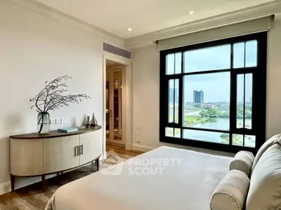 Luxurious bedroom with stunning river view and elegant decor