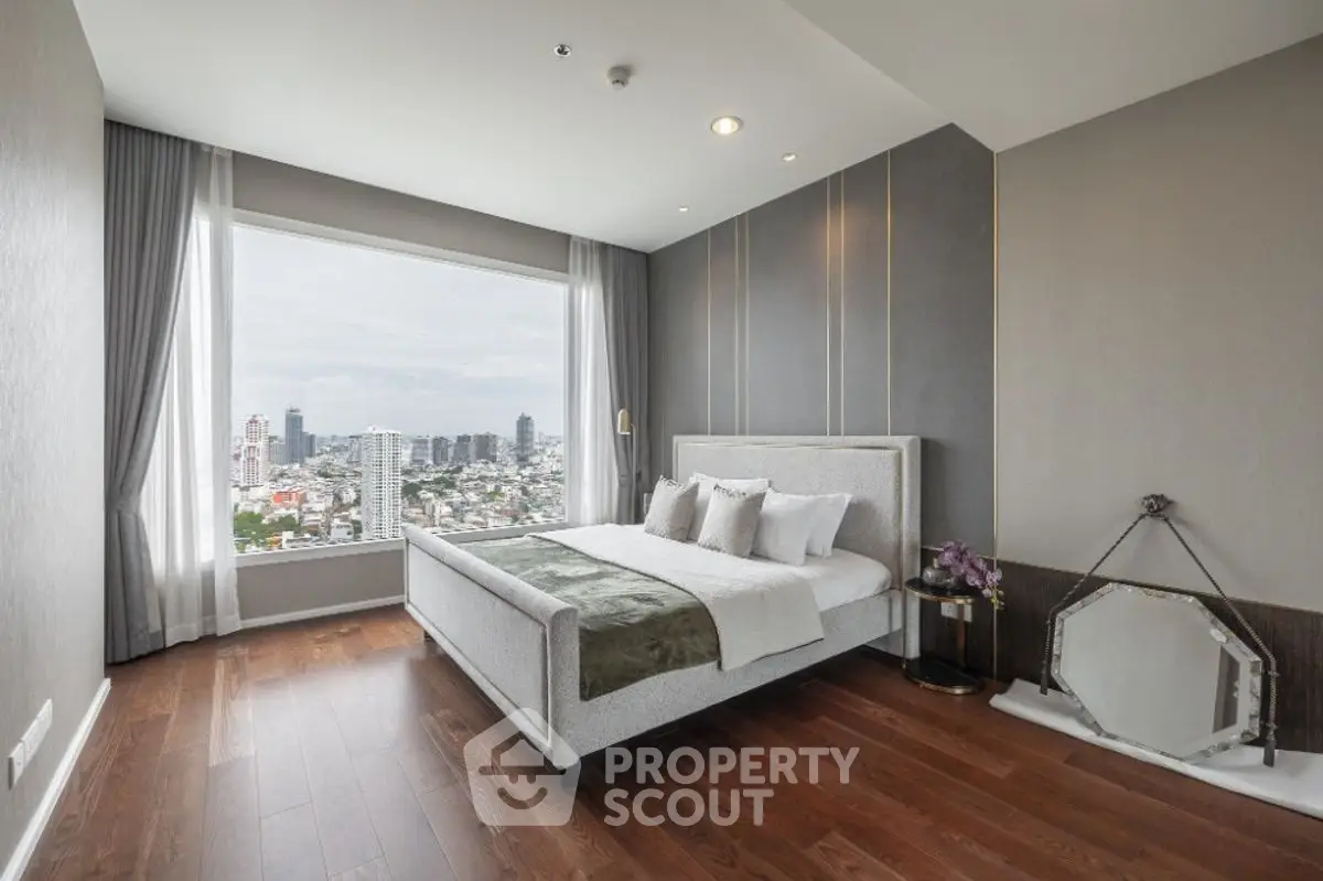 Luxurious bedroom with stunning city view and elegant decor