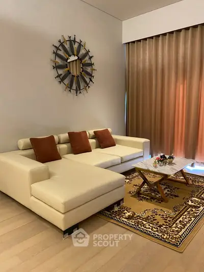 Elegant living room with modern white sofa and stylish decor