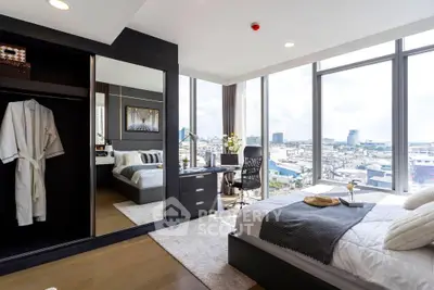 Luxurious bedroom with panoramic city view and modern furnishings