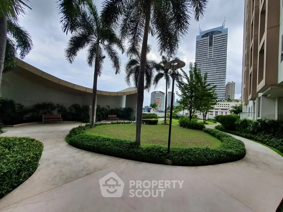 Modern urban garden with lush greenery and city skyline view