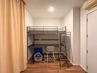 Modern bedroom with loft bed and study area, featuring wooden flooring and minimalist design.