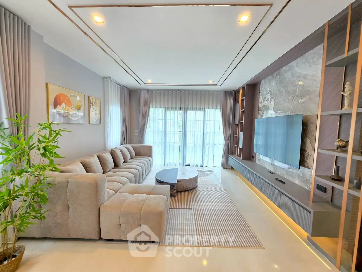 Luxurious living room with modern decor and large sectional sofa