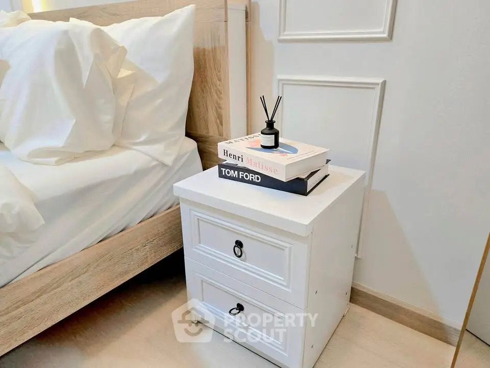 Stylish bedroom with elegant nightstand and modern decor accents
