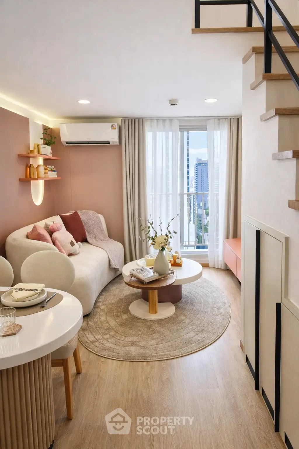 Chic modern living room with cozy seating and city view