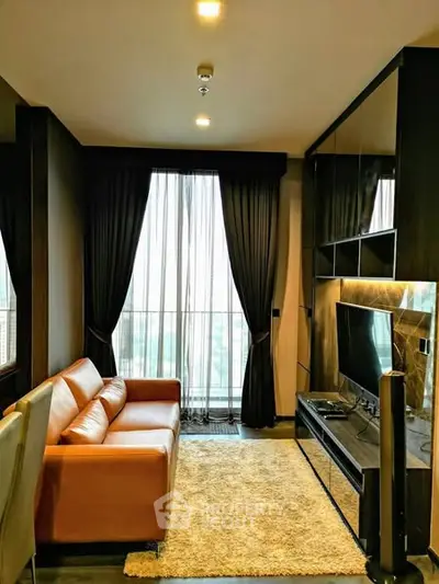 Luxurious living room with leather sofa and modern entertainment center