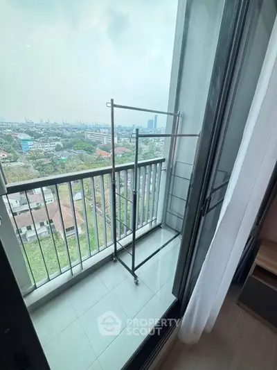 Charming balcony with city view, perfect for relaxation and enjoying the skyline.