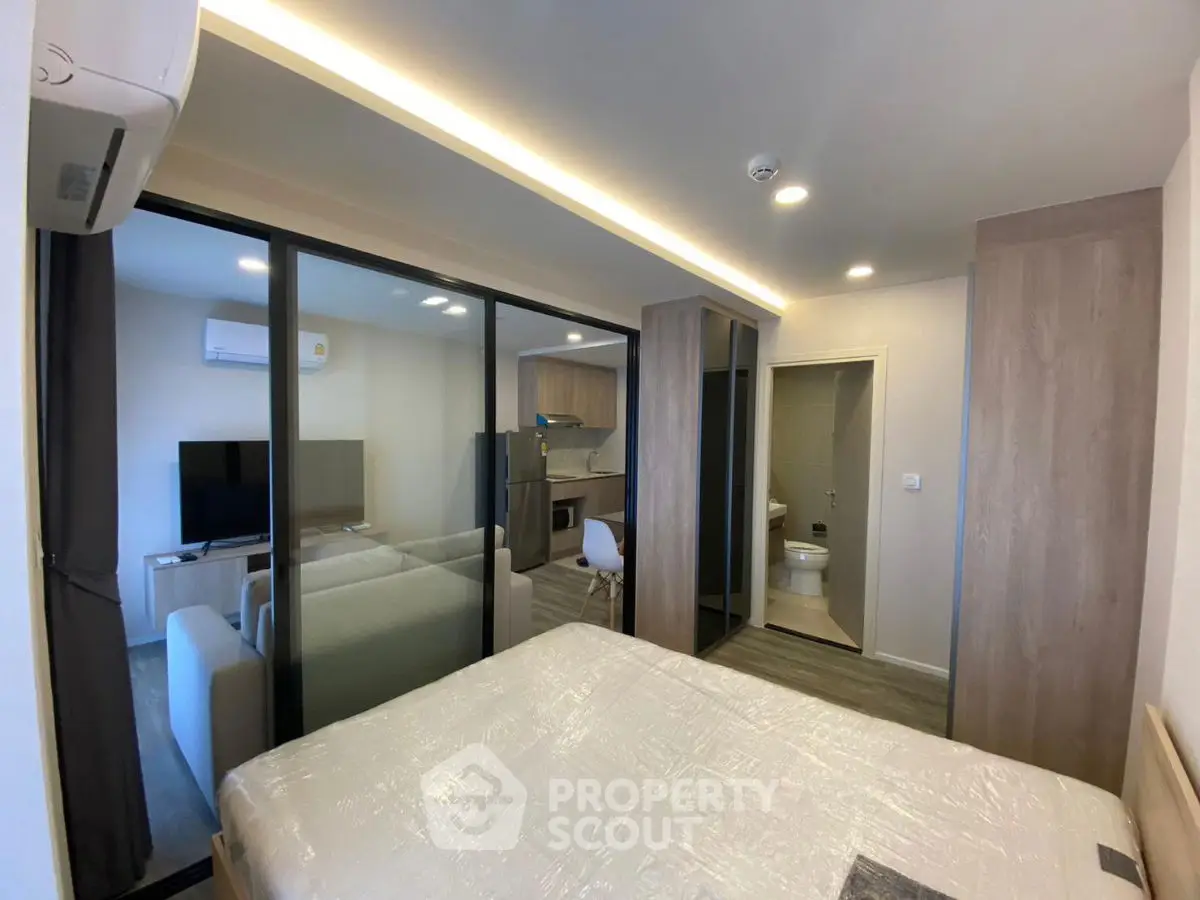 Modern studio apartment with open layout and stylish furnishings