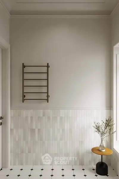 Elegant bathroom with modern towel rack and stylish decor