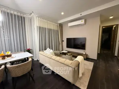 Elegant living room with modern decor and cozy seating area