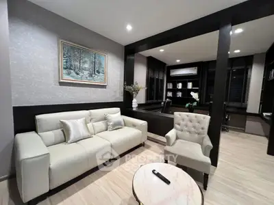 Elegant living room with modern furniture and stylish decor, perfect for relaxation and entertainment.