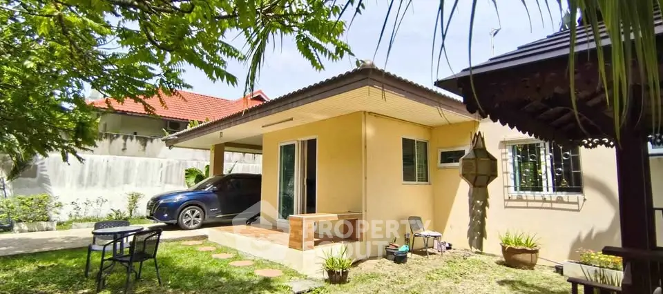 Charming suburban home with lush garden and carport, perfect for family living.