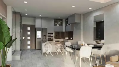 Modern open-plan kitchen and dining area with sleek design and neutral tones.
