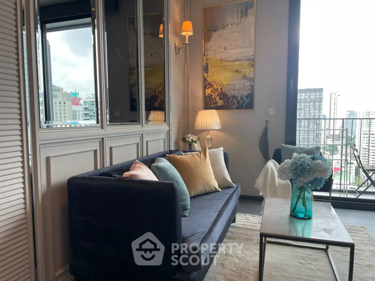 Stylish living room with modern decor and city view balcony
