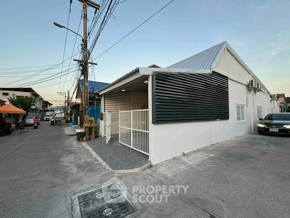 Charming corner unit house with modern exterior in a quiet neighborhood, perfect for family living.
