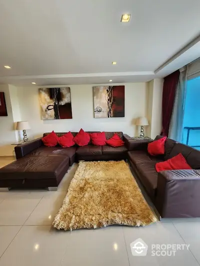 Luxurious living room with modern decor and plush seating in a high-end apartment.