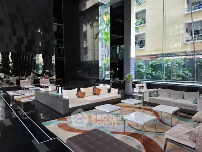 Luxurious modern living room with elegant furniture and floor-to-ceiling windows