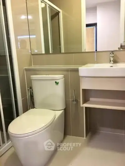 Modern bathroom with sleek fixtures and neutral tones