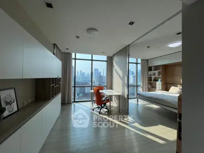 Spacious modern bedroom with city view and natural light