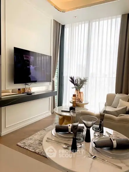 Luxurious modern living room with elegant decor and large TV