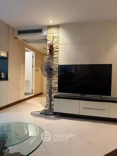 Modern living room with sleek TV unit and stylish decor