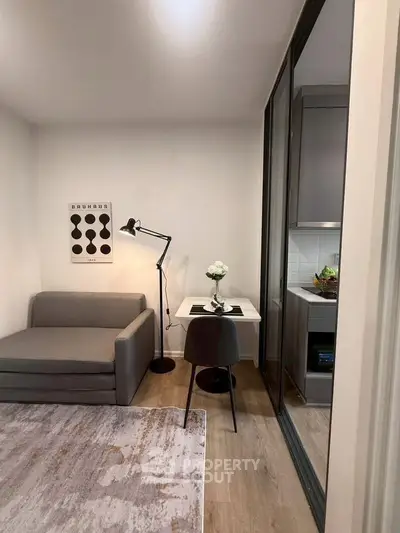 Modern compact living space with stylish decor and cozy furniture