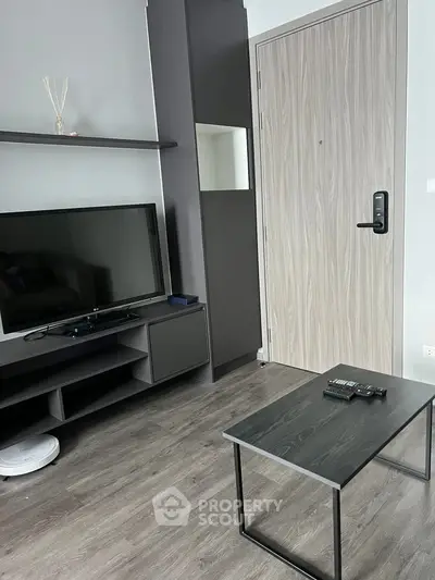 Modern living room with sleek TV setup and stylish furniture