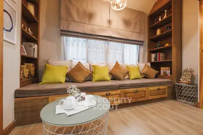 Cozy living room with built-in seating and stylish decor