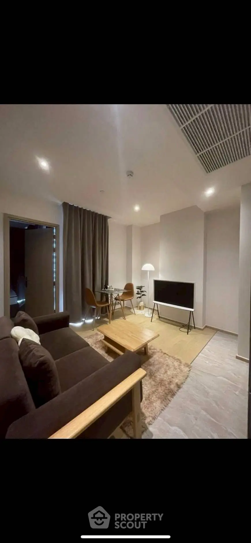 Modern living room with cozy seating and stylish decor