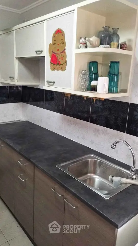 Modern kitchen with sleek countertops and stylish cabinetry