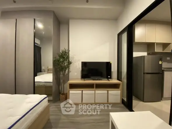 Modern studio apartment with sleek design and compact living space