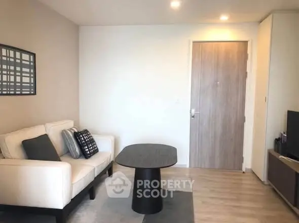 Modern living room with stylish decor and cozy seating area