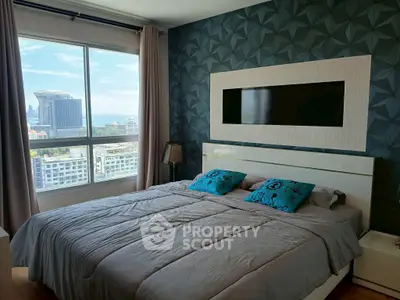 Luxurious bedroom with stunning city view and modern decor