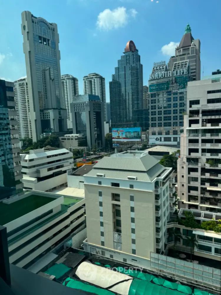 Stunning cityscape view from high-rise building showcasing modern architecture and skyline.