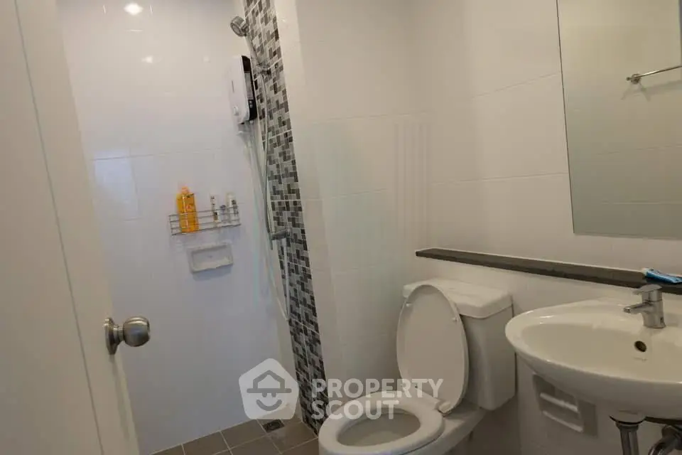 Modern bathroom with sleek fixtures and stylish tile accents