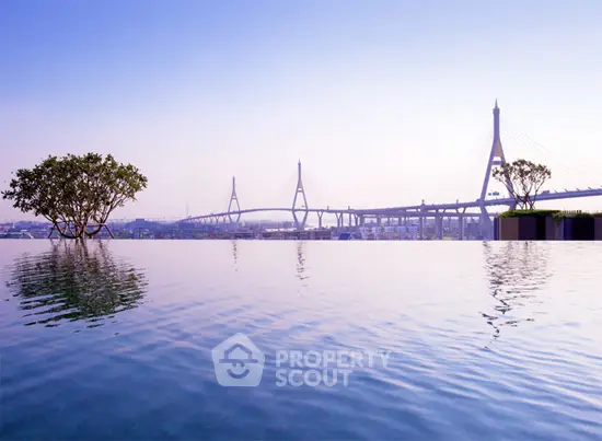 Stunning infinity pool with panoramic bridge view, perfect for luxury living.
