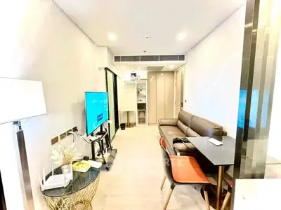 Modern living room with sleek furniture and open layout, perfect for urban living.