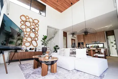 Luxurious modern living room with high ceilings and stylish decor