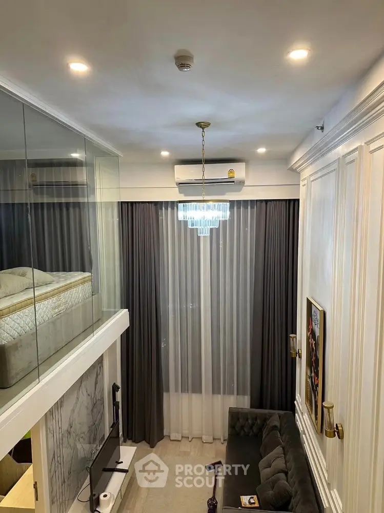 Luxurious modern living room with mezzanine bedroom and elegant decor