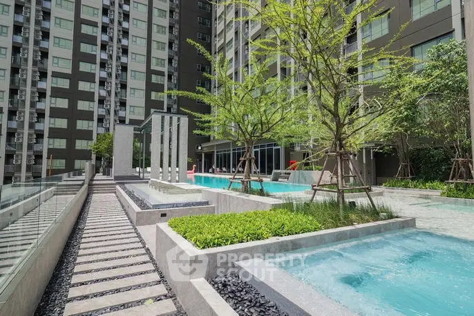 Modern condominium with luxurious pool and landscaped garden