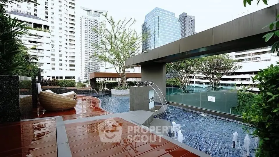 Luxurious rooftop pool with city skyline views and modern design.