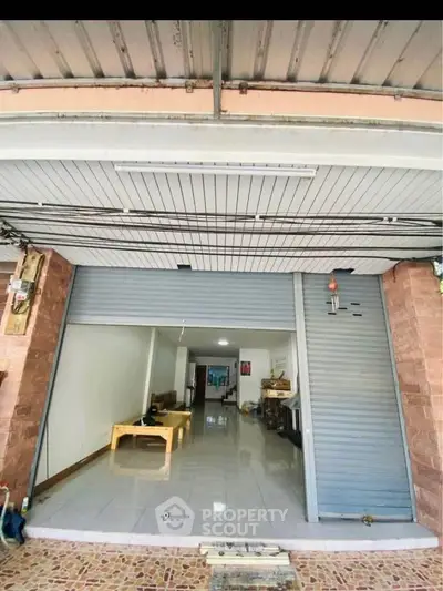 Spacious commercial property with open layout and large entrance, ideal for business opportunities.