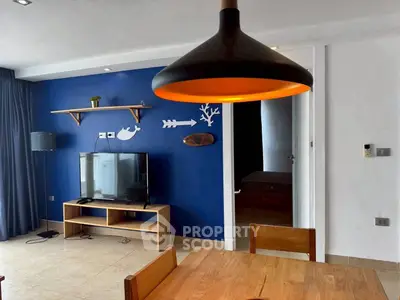 Modern living room with stylish decor and wooden furniture