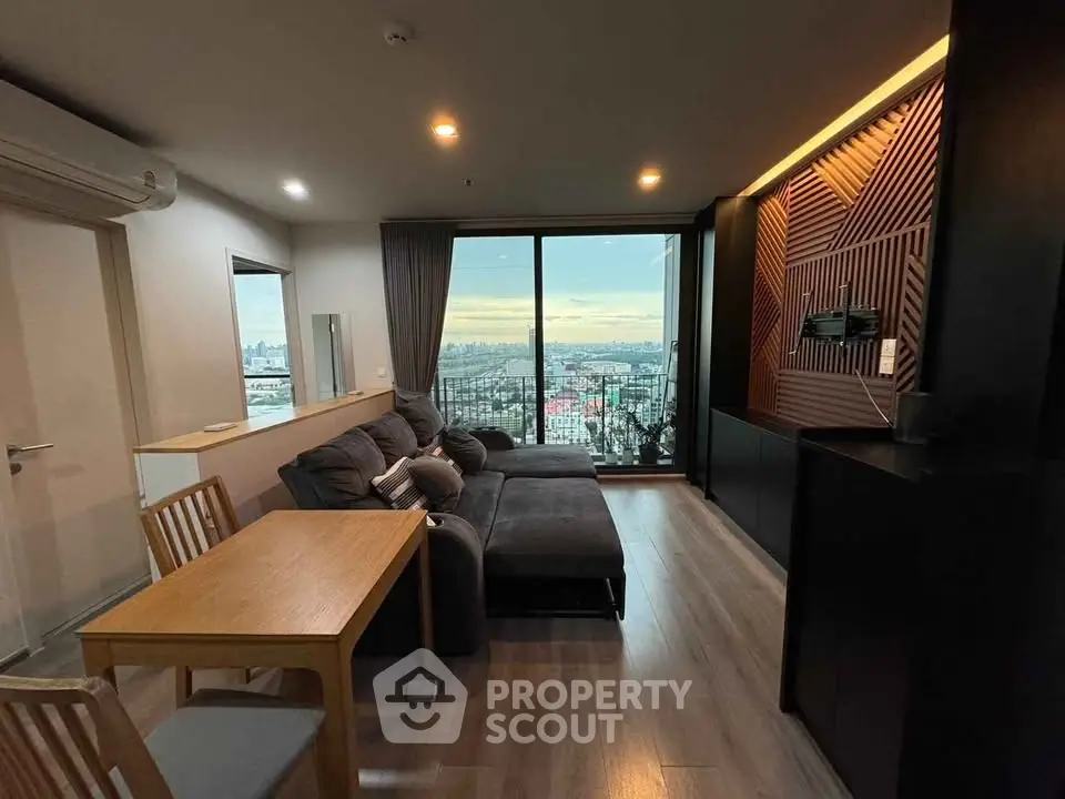 Modern living room with panoramic city view and stylish decor