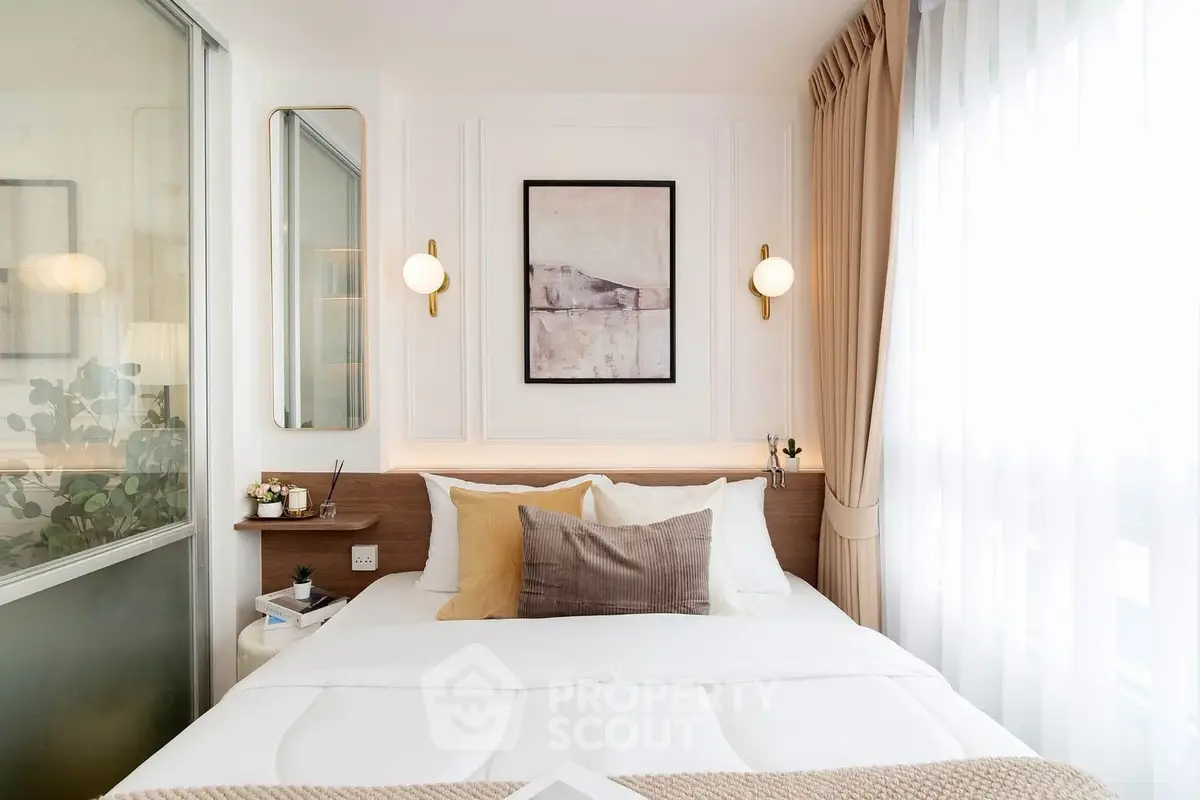 Cozy and stylish bedroom with modern decor and ample natural light