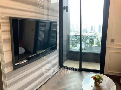 Modern living room with city view and sleek TV setup