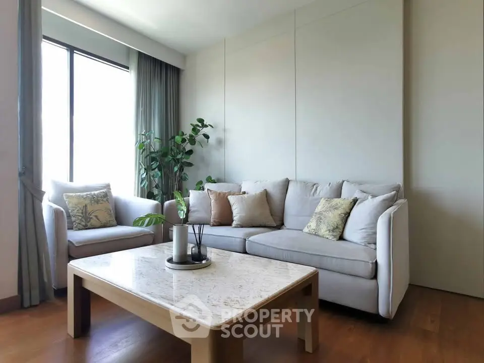 Stylish living room with modern furniture and natural light