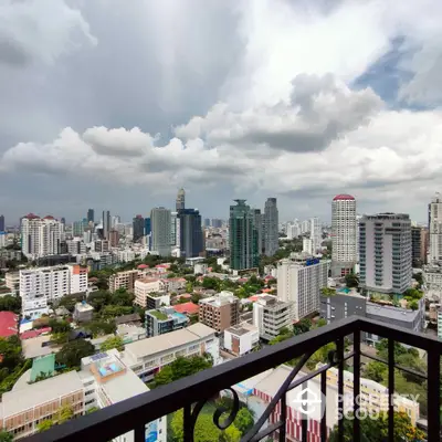 Stunning cityscape view from a high-rise balcony overlooking urban skyline