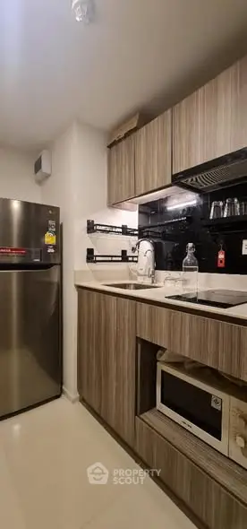 Modern kitchen with sleek cabinets and stainless steel appliances