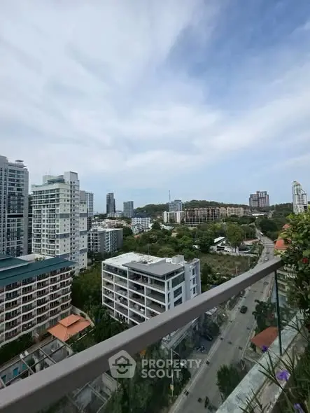 Stunning cityscape view from a high-rise balcony showcasing urban living.